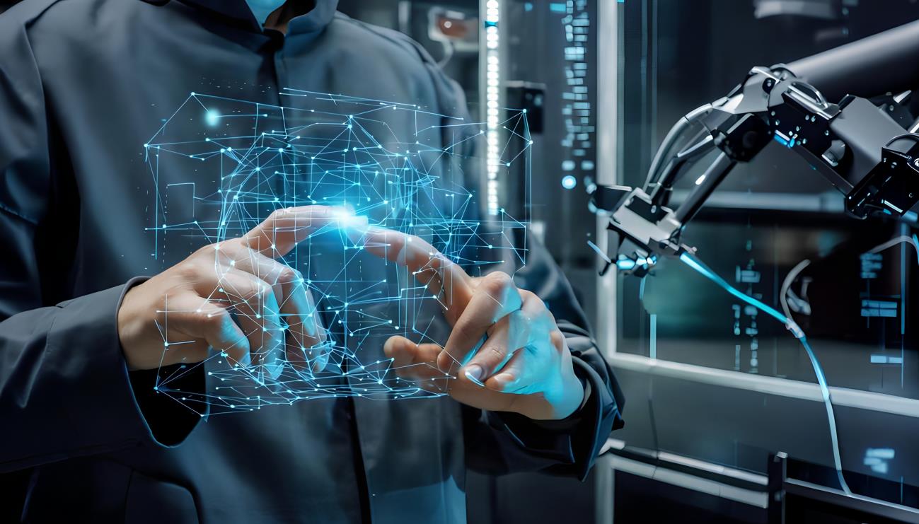Hands shaping a digital network beside a robotic arm